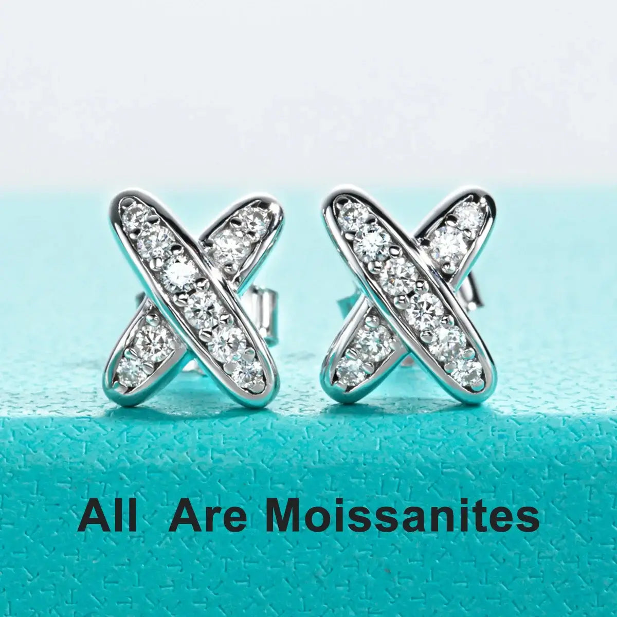 Moissanite diamond stud earrings in classic cross design, crafted from 925 sterling silver, showcasing brilliant sparkle.